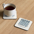 Italian Game Chess Coaster under a cup of tea on a wooden table
