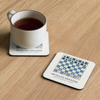 Sicilian Defense: Smith-Morra Gambit Chess Coaster under a cup of tea on a wooden table